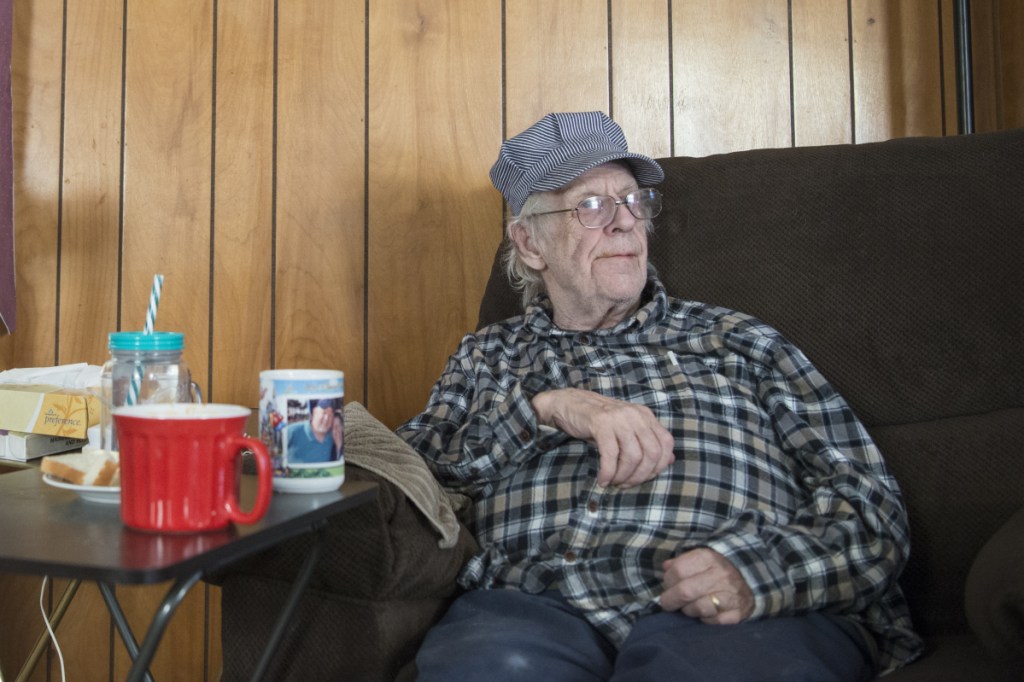 Richard Sukeforth sits for a portrait Friday, Jan. 26, at his daughter's mobile home in Holden. Sukeforth has been living there since he was evicted from his home in 2015.