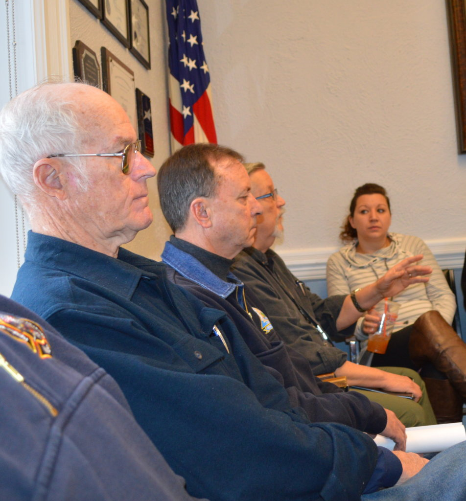 Franklin County Regional Communications Center Director Stan Wheeler, third from left, addresses county commissioners Thursday in Farmington. Listening are, from left, Farmington Deputy Fire Chief Clyde Ross, county Emergency Management Agency Director/Farmington Deputy Fire Chief Tim Hardy, Wheeler, and EMA Deputy Director Amanda Simoneau. Partially pictured on the left is Farmington Fire Rescue Chief Terry Bell.