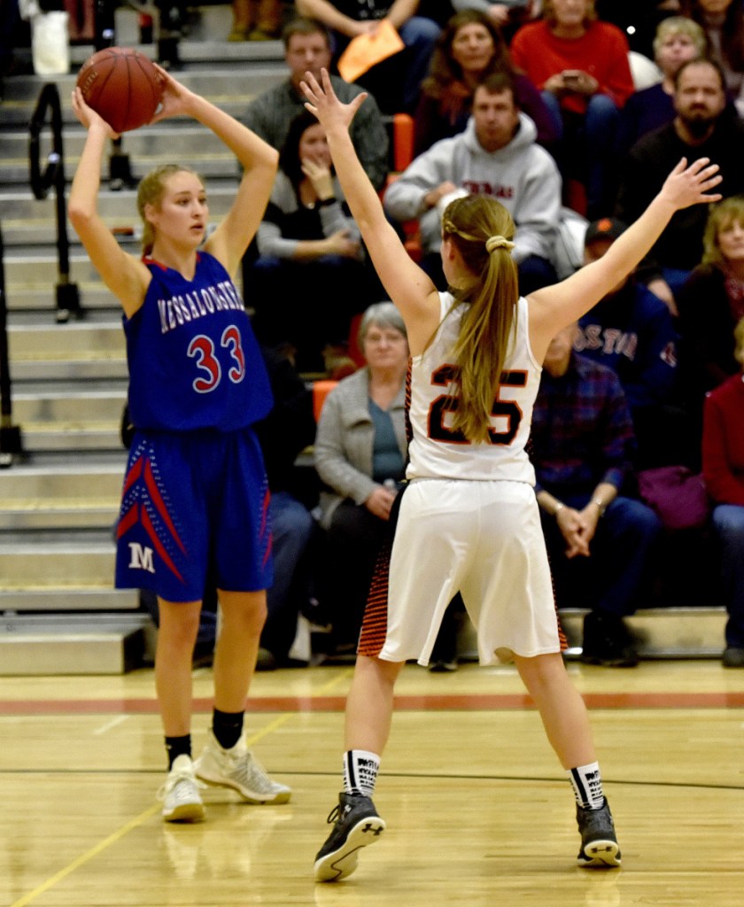 Skowhegan's Sydney Ames defends Messalonskee's Ally Turner during a Kennebec Valley Athletic Conference Class A game Monday night in Skowhegan.