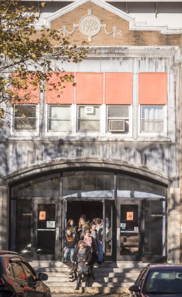 Students emerge from Winslow Junior High School at the end of the school day on Nov. 8, 2017. A town building committee will present the Town Council on Monday a new proposal for closing the junior high and creating space for the affected grades.