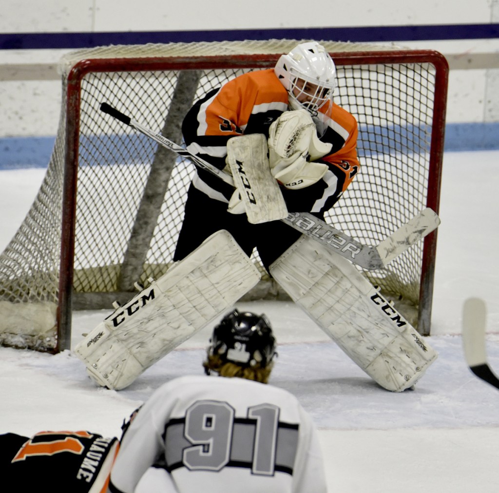 Staff photo by David Leaming 
 Gardiner goalie Quinn Veregge makes a save during a game Monday against Kennebec at Colby College.