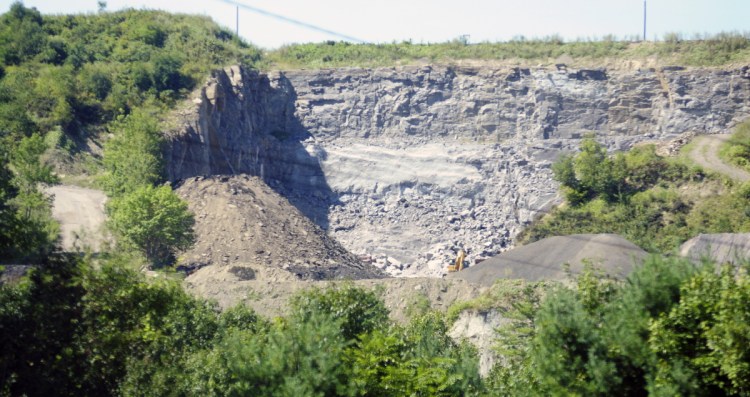 A McGee blasting pit is seen from east side of Kennebec River on Sept. 4, 2015, in Augusta.