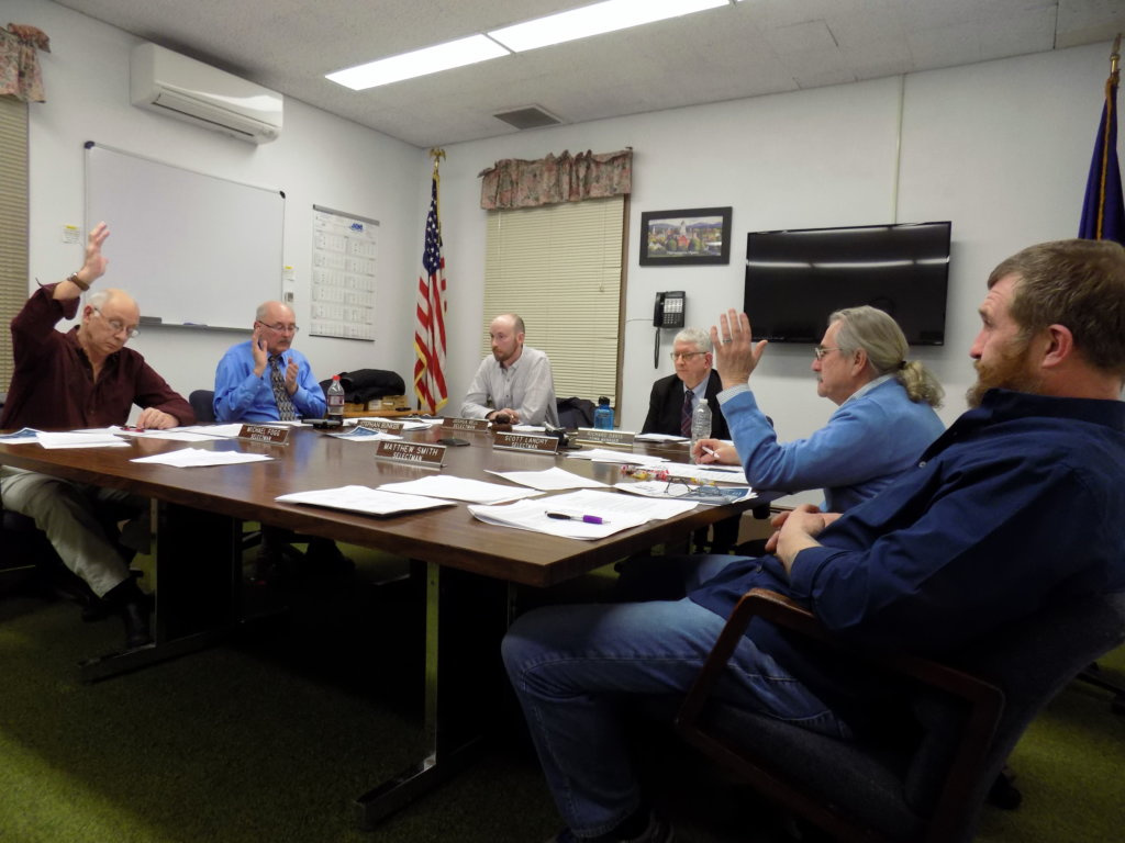 Farmington selectmen voted Tuesday to place articles on the March 24 town meeting warrant regarding funding of nonprofit economic development and social service agencies. From left are Selectmen Michael Fogg, Stephan Bunker and Joshua Bell, Town Manager Richard Davis and Selectmen Scott Landry and Matthew Smith.