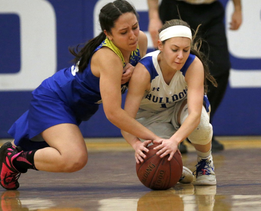 Mt. Abram's Summer Ross, left, and Madison's Sydney LeBlanc fight for possession of the ball during the first half of a Mountain Valley Conference game this season.