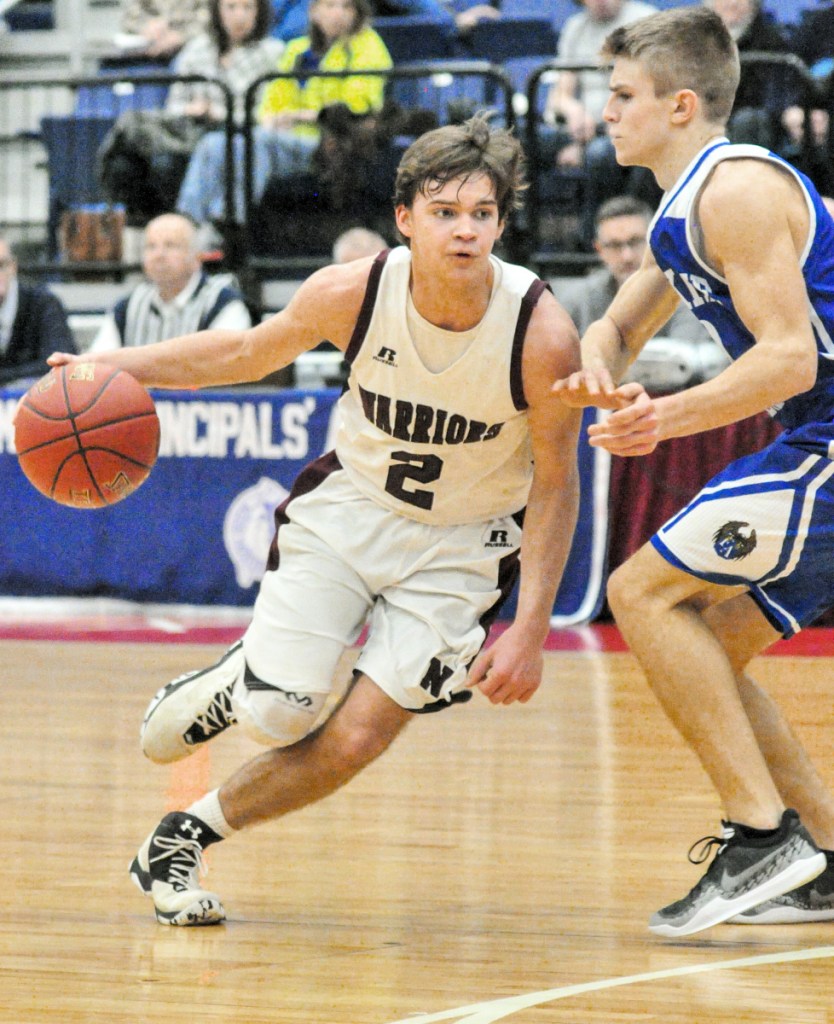 Nokomis' Josh Smestad, left, tries to get around Erskine's Jack Jowett during a Class A North quarterfinal game Saturday at the Augusta Civic Center.