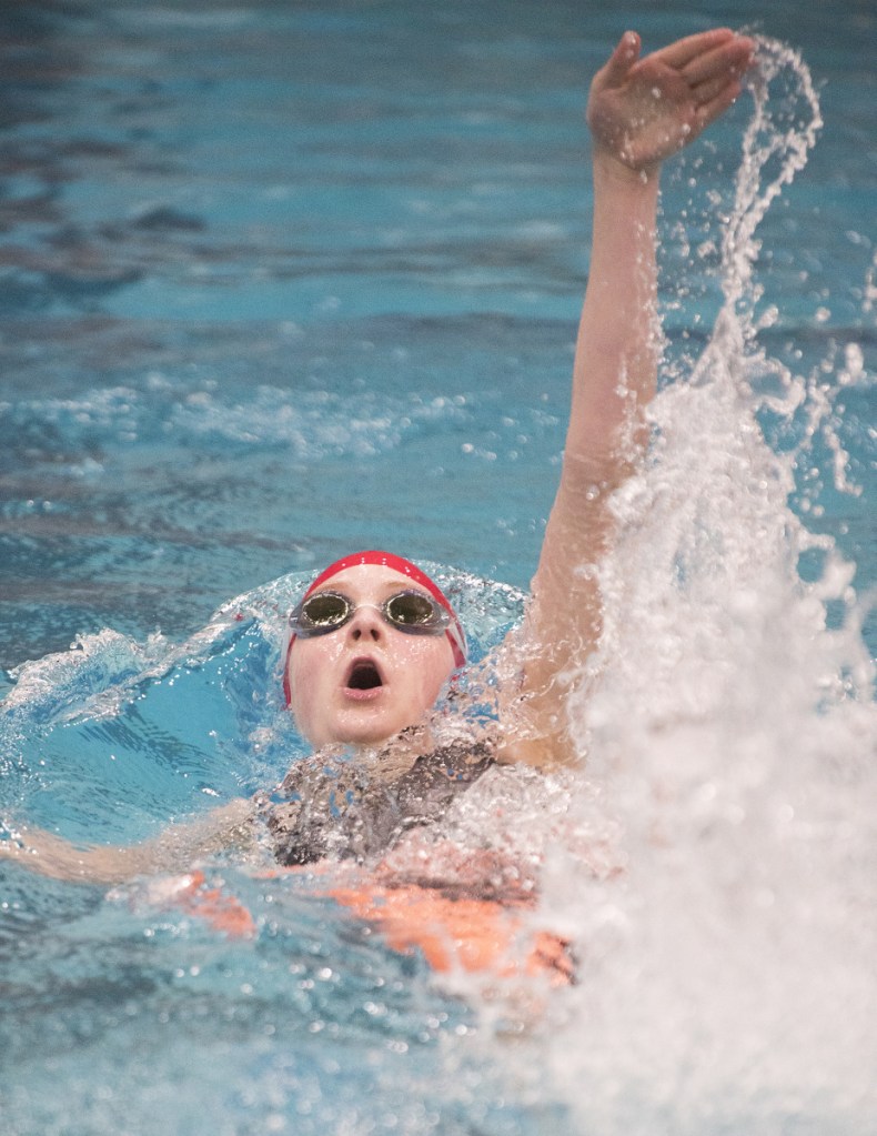 Tessa Jorgensen of Cony competes in the 200-yard medley relay during the Class A state championship meet Monday in Orono.