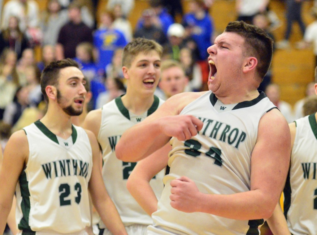 Winthrop's Sam Figueroa roars at fans while the Ramblers celebrate a Class C South semifinal victory over Boothbay on Thursday at the Augusta Civic Center.