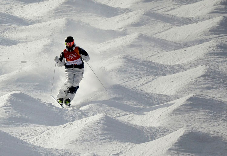 Troy Murphy of Bethel takes on the bumps Friday in the men's moguls qualifying round in Pyeongchang, South Korea. Murphy finished fourth to advance to the finals.