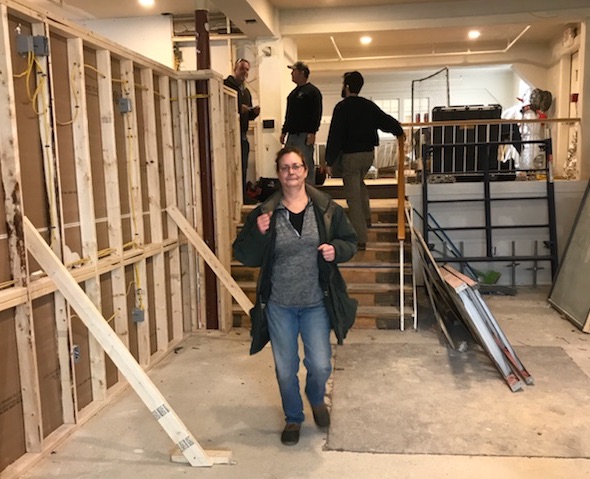 Becky Marcos, one of the owners of The Odd Duck, a new steakhouse in Brunswick, checks over renovations.