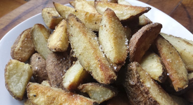 This recipe for Really Crispy Roasted Potatoes is adapted from one in Nigella Lawson's Christmas cookbook.