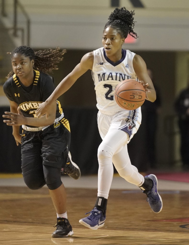 Tanesha Sutton drives down the court during Maine's victory over UMBC on Saturday in the America East quarterfinals in Portland. The 5-foot-10 junior leads the Black Bears in rebounding (7.2) and is second in scoring (12.0).