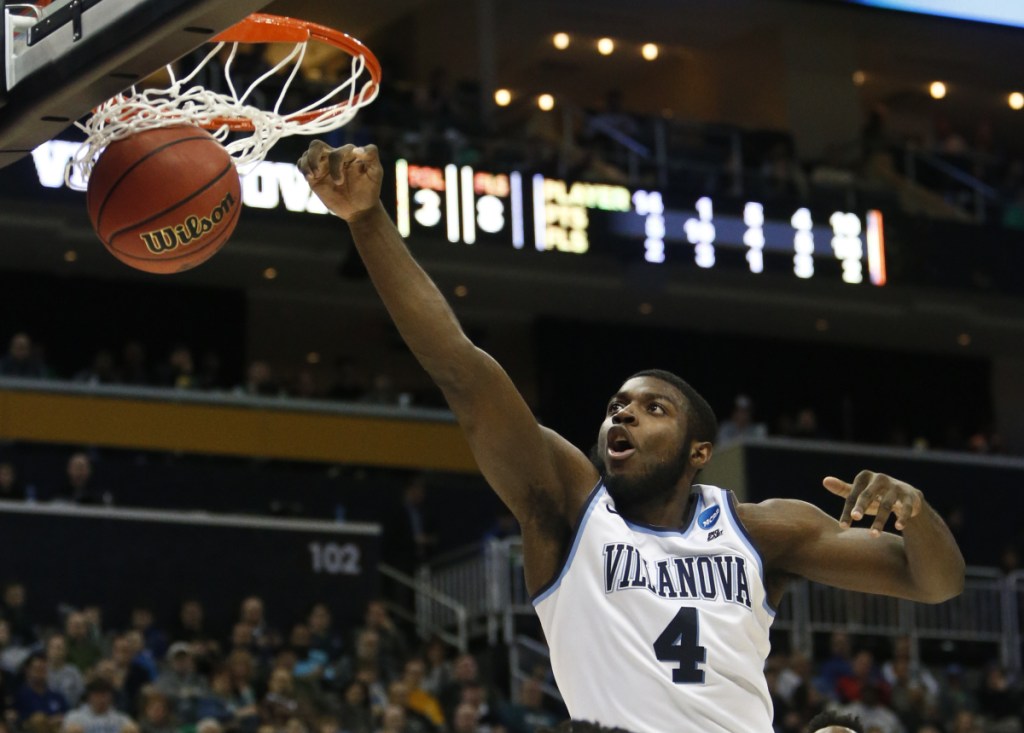 Villanova's Eric Paschall dunks during the second half of his team's 81-58 win over Alabama in the second round of the NCAA men's basketball tournament Saturday in Pittsburgh.