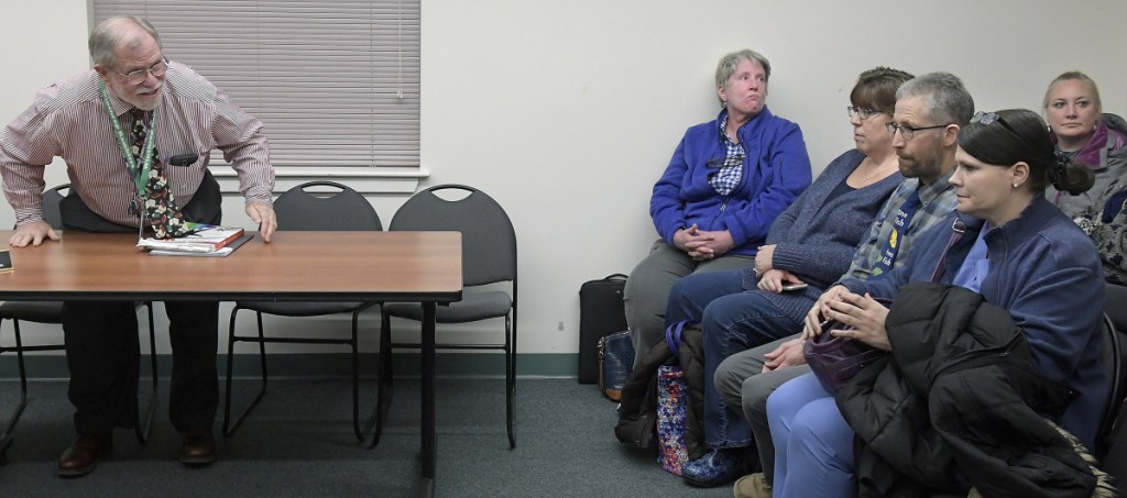 About 20 teachers and administrators of the Winthrop School Department attended a School Board meeting on Monday, but they had to wait outside, as much of the discussion was in executive session to discuss personnel matter. Gary Rosenthal, left, superintendent of the district, was present for the meeting between the board and attorneys.