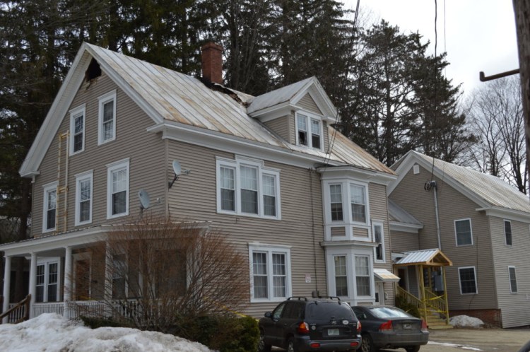 Fire heavily damaged the attic of a multi-unit apartment building on Monday night at 119 Lake Ave. in Farmington, Farmington fire Capt. Tim Hardy said Tuesday.