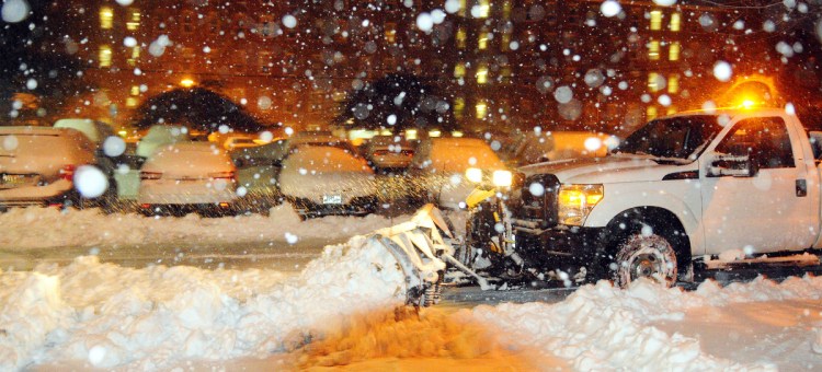 Hallowell Public Works plow truck driver Todd Talon clears snow from Perleys Lane around 5:25 a.m. on March 8 in Hallowell. Another nor'easter is due to blow into the region Tuesday through Wednesday, bringing a foot or more of snow.