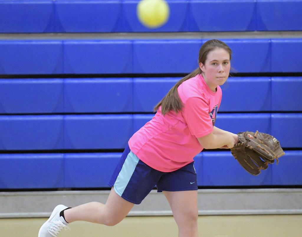 Gardiner senior Meghan Meehan delivers a pitch during practice Monday afternoon in Gardiner.