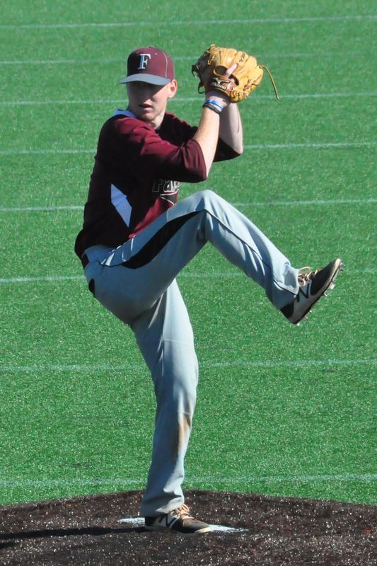 University of Maine at Farmington pitcher Riley Chickering delivers a pitch during the 2017 season.