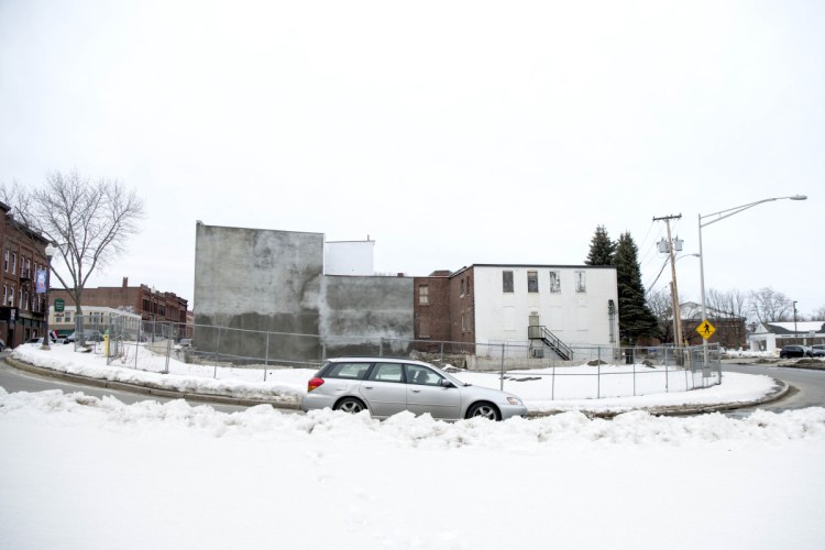 Colby College plans to build a boutique hotel on this Waterville site, shown Wednesday. The college has decided to develop and manage the project itself after firing Kevin Mahaney and The Olympia Cos. recently.