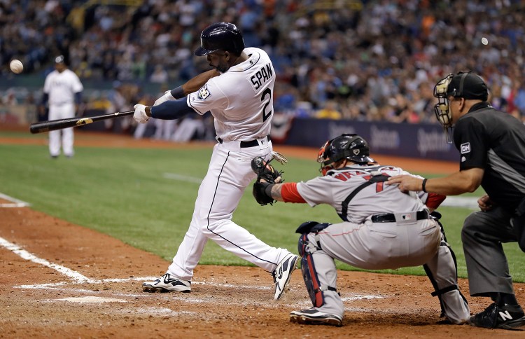 Tampa Bay's Denard Span connects for a three-run triple off Red Sox reliever Carson Smith in the eighth inning Thursday.