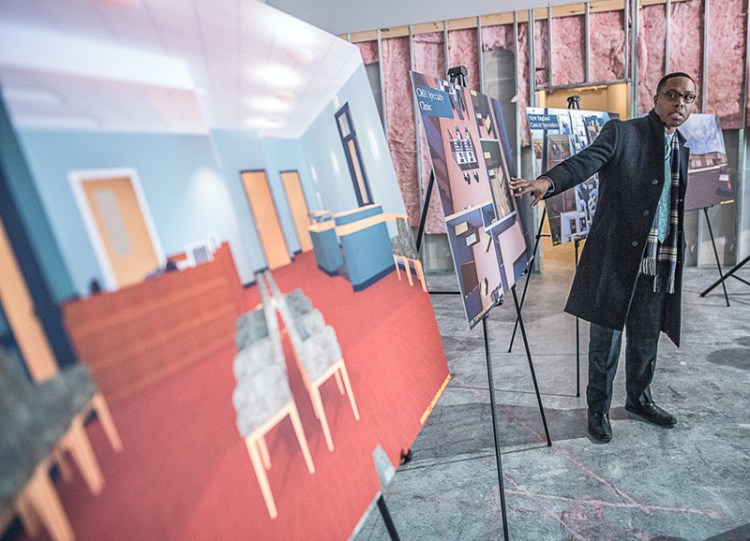 Chip Neilson, director of contracting and business development for Central Maine Healthcare, presents architectural renderings of the new Topsham Care Center that is being created in the former Best Buy building in Topsham.