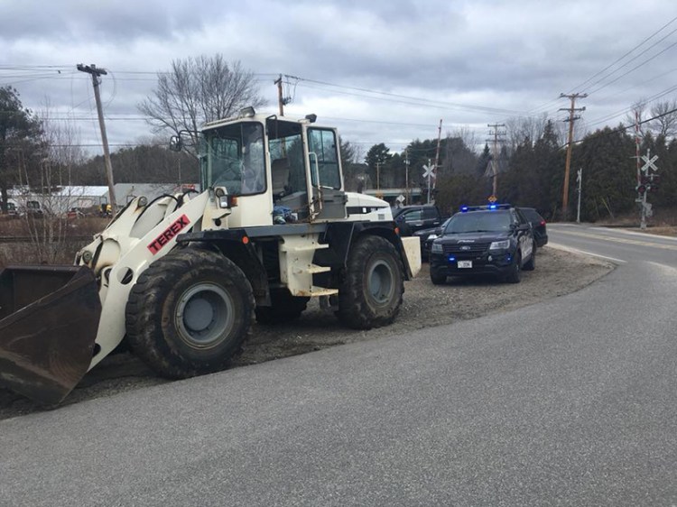 Front-end loader near Blackstrap Road on the tracks in Falmouth Saturday morning. 