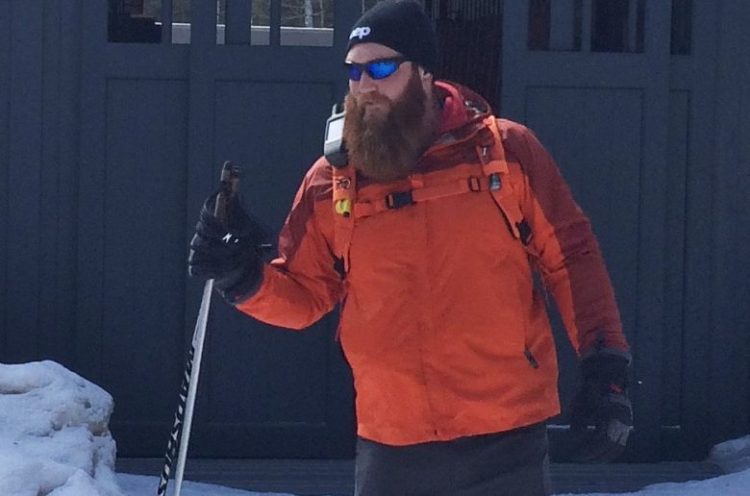 Registered Maine Guide Josh Stahl waits for students at the Maine Outdoor Education Program lodge. The $5 million lodge opened to students a month ago and will welcome the general public in the fall.