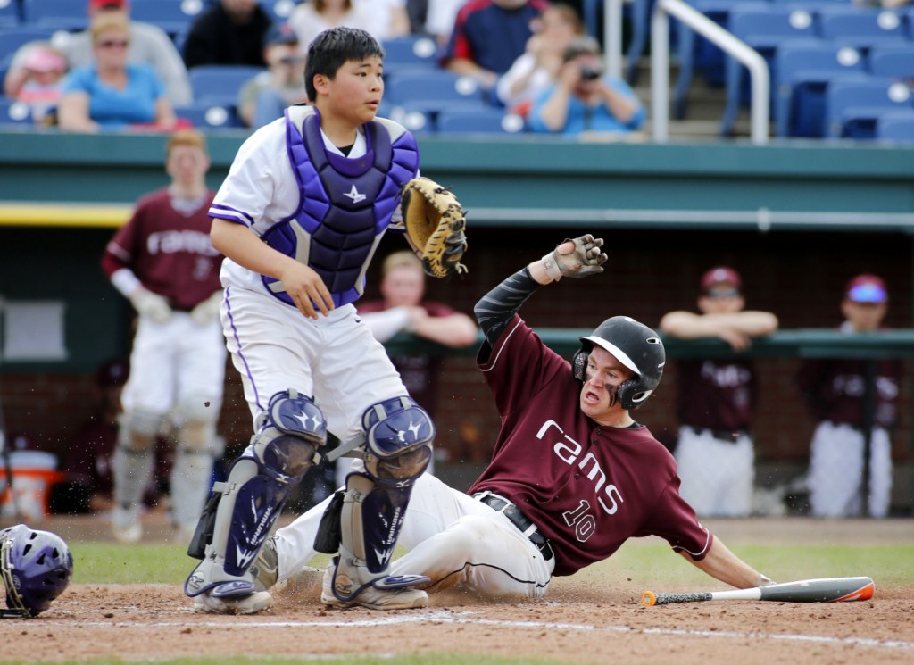 Princehoward "Barbecue" Yee of Deering High waits for the throw during a varsity game last April. He is not eligible to play varsity this year pending the outcome of a lawsuit.