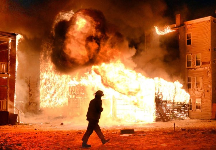 Lewiston fire Capt. Rick Cailler was first on the scene at a major fire on Pierce and Bartlett streets in Lewiston on May 3, 2013. 