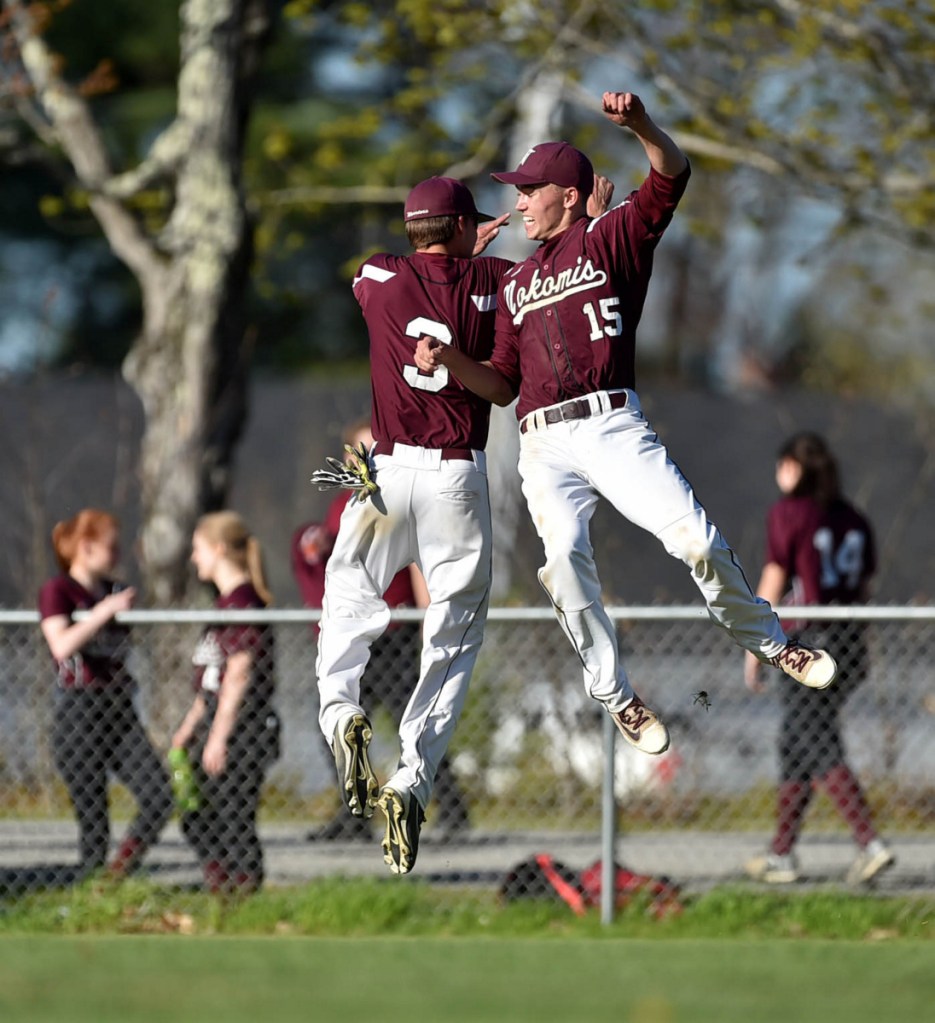 Staff photo by Michael G. Seamans 
 Nokomis pitcher Josh Perry, right, celebrates a three-hit shutout over Erskine with teammate Josh Smestod last season in South China.