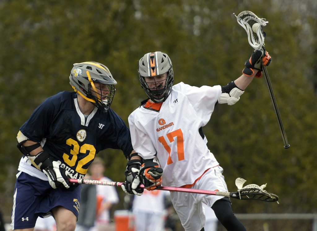 Gardiner's Jake Weston, right, is defended by Mt. Blue's Dom Giampietro during a game Thursday in Gardiner.