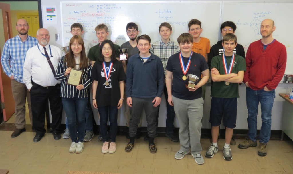 The Maine School of Science and Mathematics Math Team in front, from left are Math Department Chairman Pete Pedersen, Hyoju Kweon, Eunice Liu, Tobyn Blatt, James Hawkes and Jordan Theriault. In back, from left, are math instructor Todd Smith, Brett Foster, David Govoni, Wyatt Giroux, Ethan Winters, Wesley Chalmers, Jack Kang, math instructor Mark Rhodes.