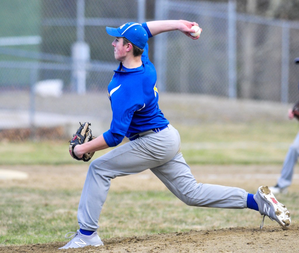 Mt. Abram pitcher Nate Luce throws to the plate against Oak Hill  on Friday in Wales.