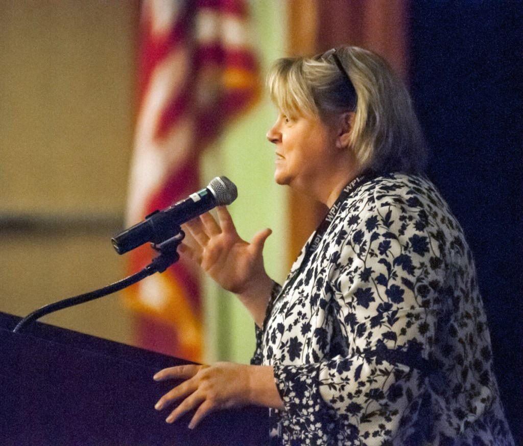 Cony Middle and High School Principal Kim Silsby speaks on Thursday at Cony High School in Augusta, welcoming German Consul General Ralf Horlemann to the school.