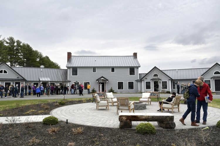 Visitors Sunday inspect the Travis Mills Foundation during an open house in Rome.