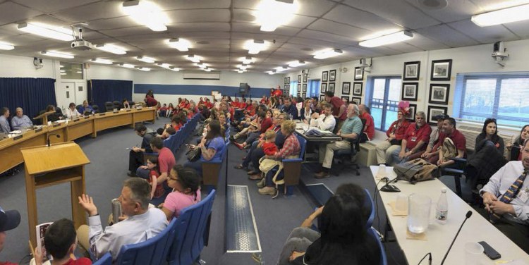 More than 100 Westbrook teachers staged a demonstration at a school committee meeting in May to call for a new contract.