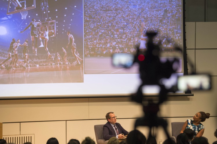 Justin McCann talks with ESPN's Jemele Hill during "Freedom to Speak: A Conversation with Jemele Hill on Athletics and Activism" at Ostrove Auditorium at Colby College on Tuesday.