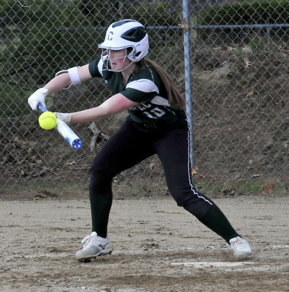 Carrabec's Bailey Dunphy bunts during a game against Oak Hill last season.