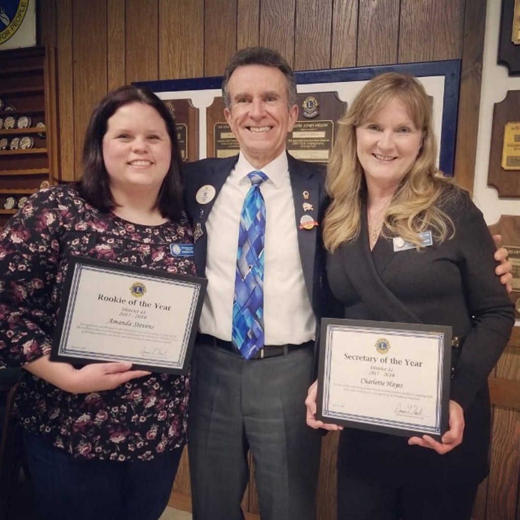 Lion Amanda Stevens, left, with District Gov. Norm Hart and Lion Charlotte Hayes.