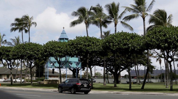 Uber driver Joshua Oh drives in Honolulu on Wednesday. Honolulu city councilors approved a bill that won't allow ride-hailing services to impose so-called "surge pricing" on riders.