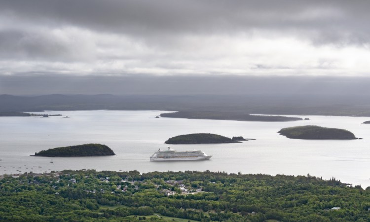 The cruise ship Adventure of the Seas sits off Bar Harbor in early June.