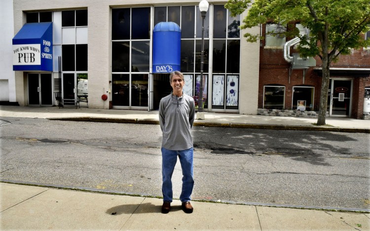 Kevin Joseph, owner of You Know Whose Pub in the Concourse in Waterville, stands on Wednesday in an area in front of his business and the Itali-ah restaurant where he and Jennifer Bergeron, the owner of Itali-ah, have asked that the street be closed to vehicular traffic so they can offerr outdoor dining.