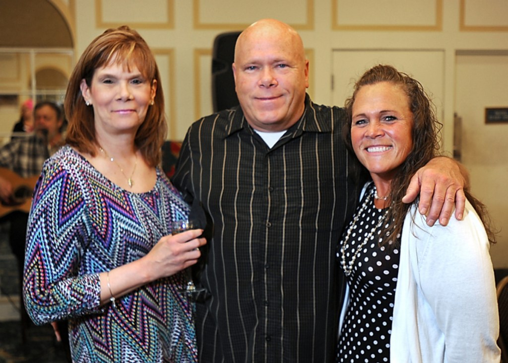 Camp POSTCARD volunteers, from left are Ruthann Shea, Al Shea and Jody Praul.