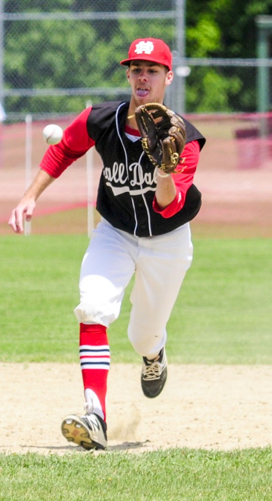 Hall-Dale shortstop Alec Byron fields a bouncing ball during a Class C South semifinal game Saturday in Farmingdale.