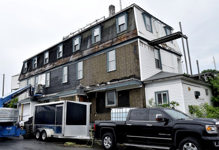 The historic Kennebec Valley Inn in Skowhegan is in the process of being demolished on Monday.