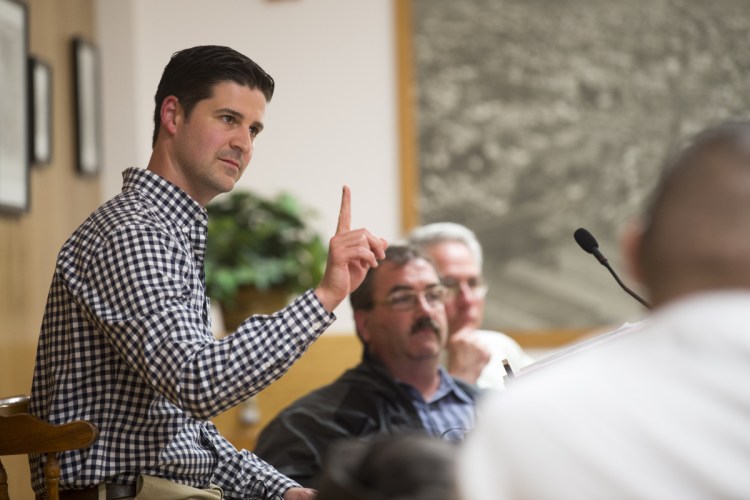 Mayor Nick Isgro raises his finger as city manager Mike Roy asked him to take the podium to clarify the outdoor dining ordinance during a budget meeting at the City Council Chambers at The Center on June 5. Isgro has said he will veto the city and school budget if it required a tax increase of more than 3 percent. The City Council takes a second vote on the budget Tuesday night.