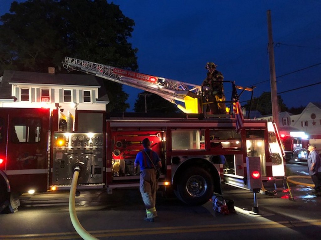 Firefighters from eight communities battled a blaze at an apartment in Oakland on Wednesday night. The Oakland fire chief said one person was sent to the hospital.