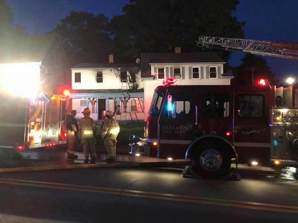 Firefighters from eight communities battled a blaze at an apartment in Oakland on Wednesday night. The Oakland fire chief said one person was sent to the hospital.