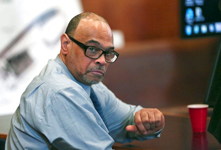 Shaun Harrison listens as attorneys give closing arguments in Suffolk Superior Court in Boston. Harrison, who was known as an anti-violence advocate, was convicted of shooting and nearly killing a 17-year-old student.