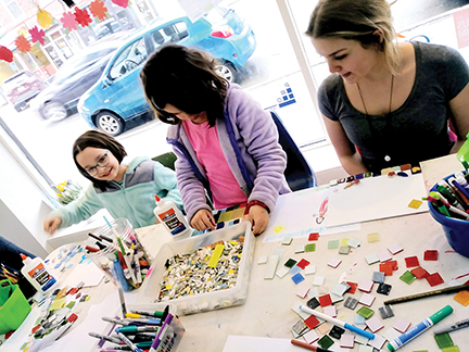 Kids creating their own artworks at the Waterville Creates! December Joy to the Ville event.  Waterville Creates! contributed photo 
