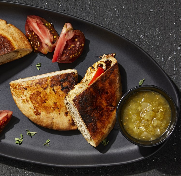 Cut into half moons, their resulting pockets provide the right amount of space for tucking in cheese.